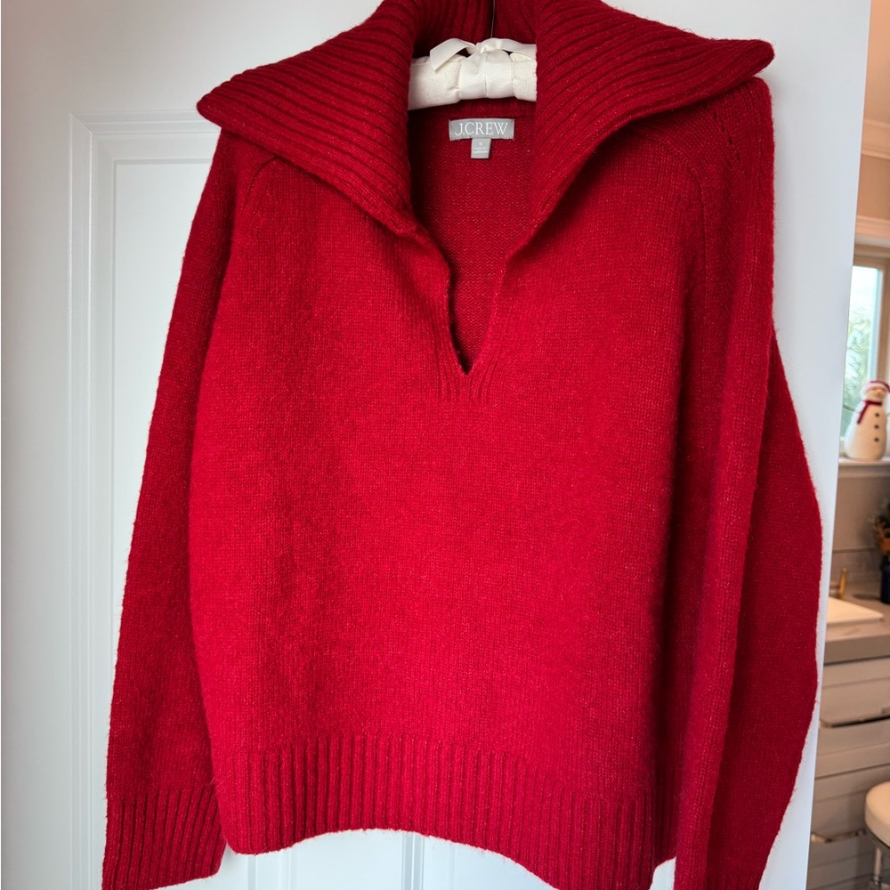 New - never worn. Cardinal red sweater size Medium. Excellent condition!